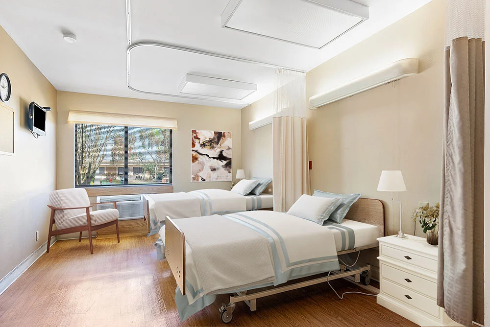 A bright interior view of a shared resident room