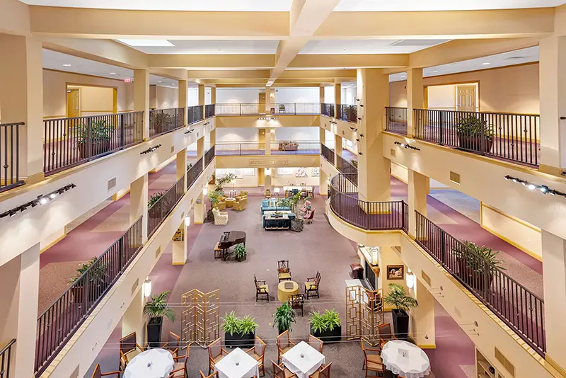Bright common area with seating and plants