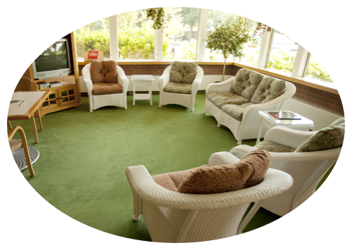 Comfortable seating area in a bright common room