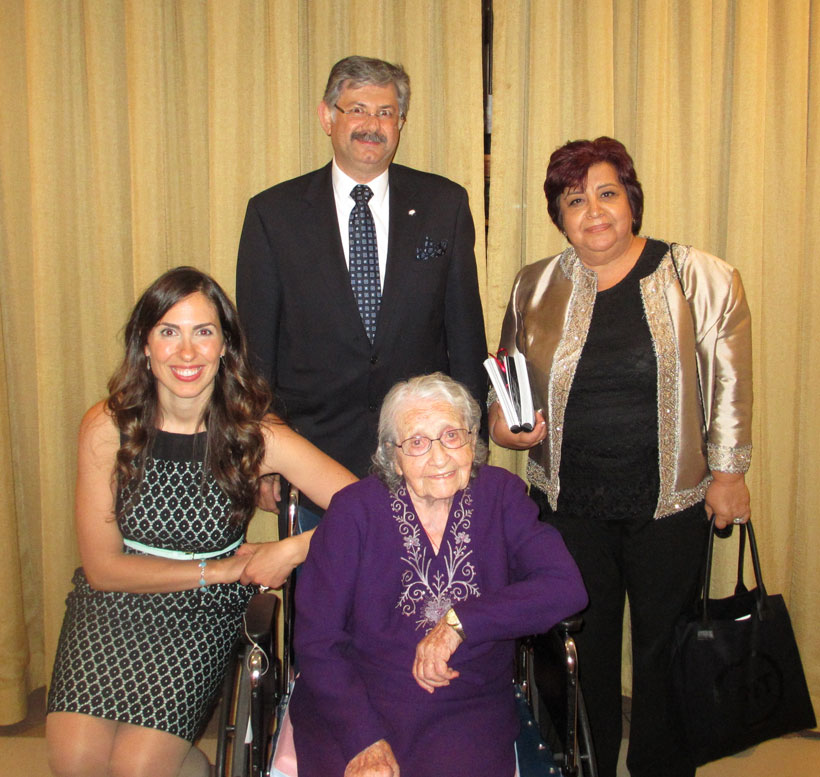 Group photo of residents and staff members.