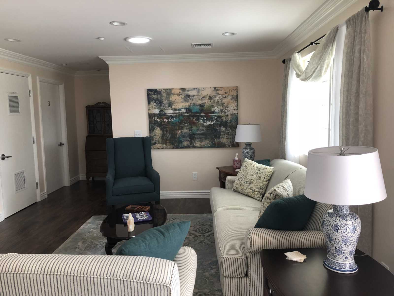 Cozy common area with seating and decor.