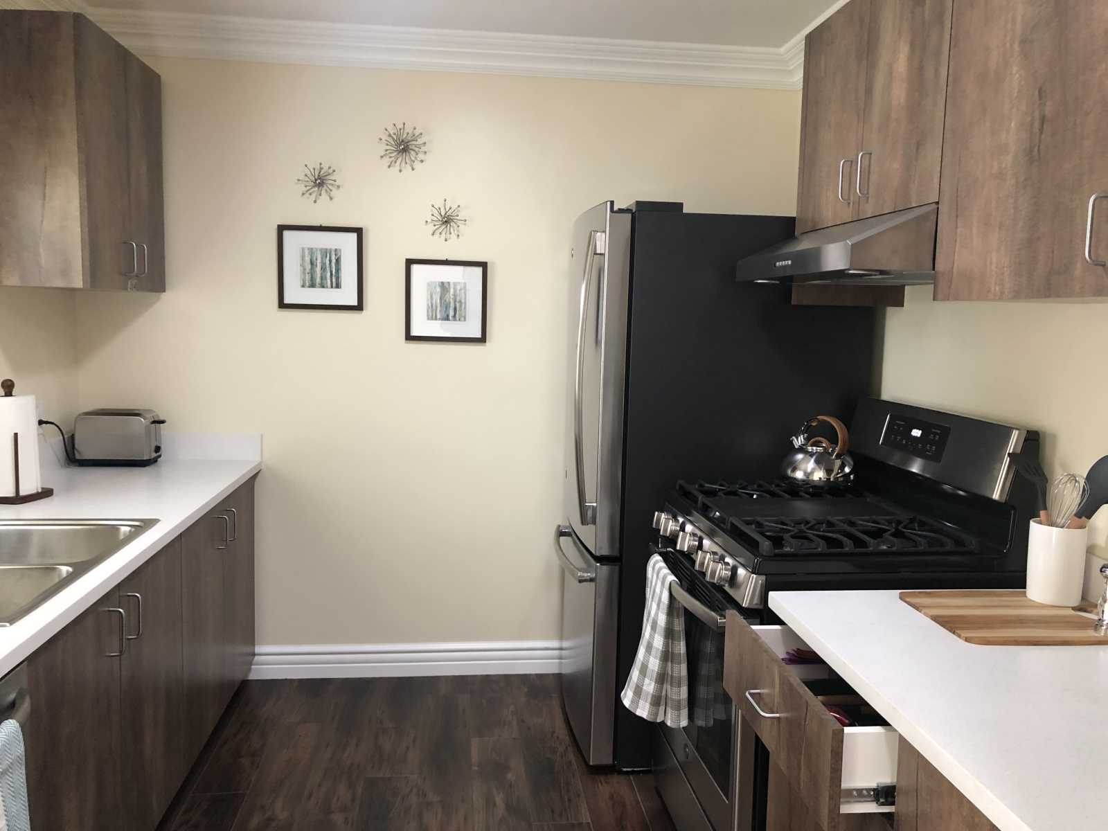 Modern kitchen with stainless steel appliances