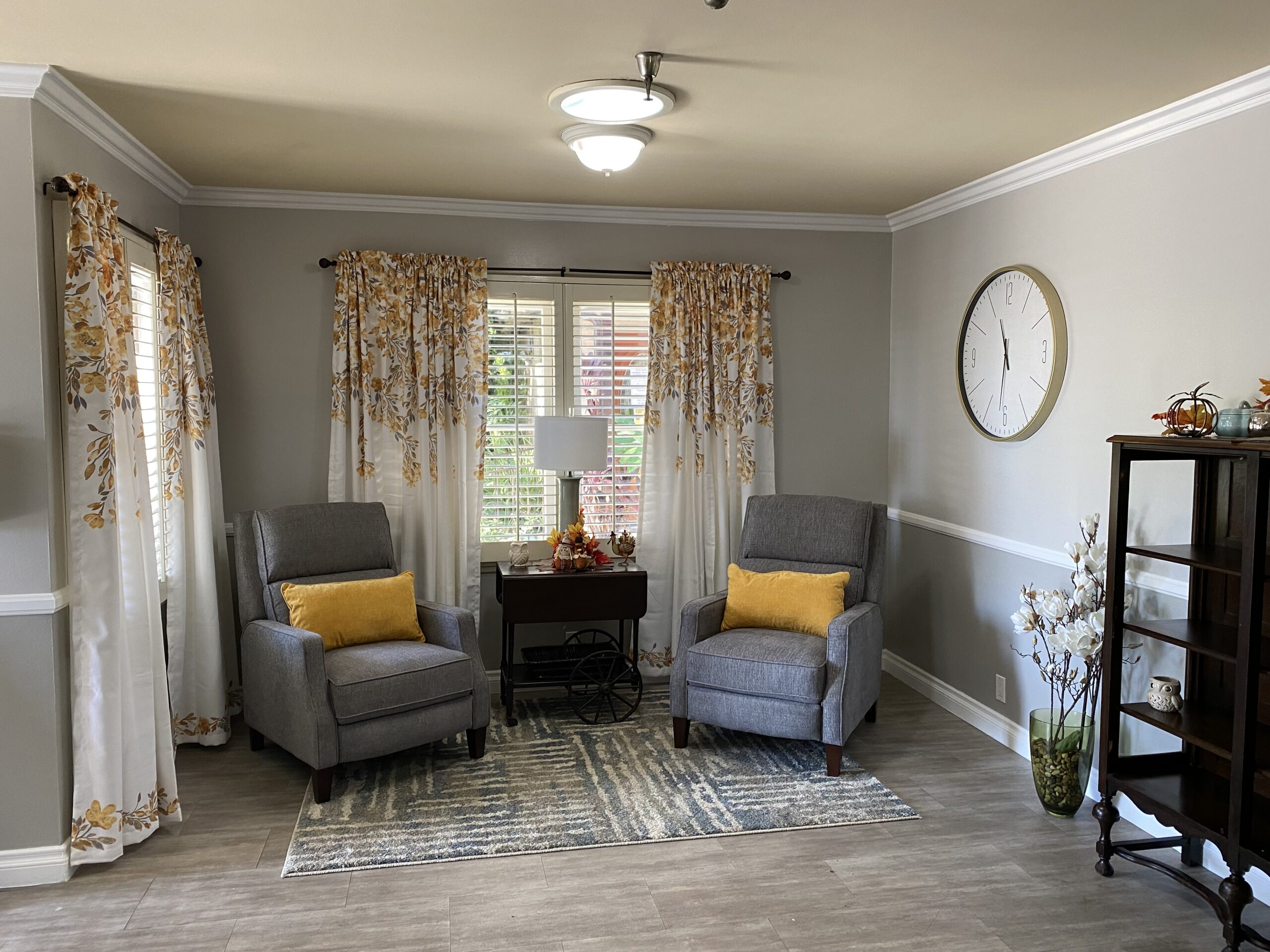 Cozy lounge area with comfortable chairs and decor.