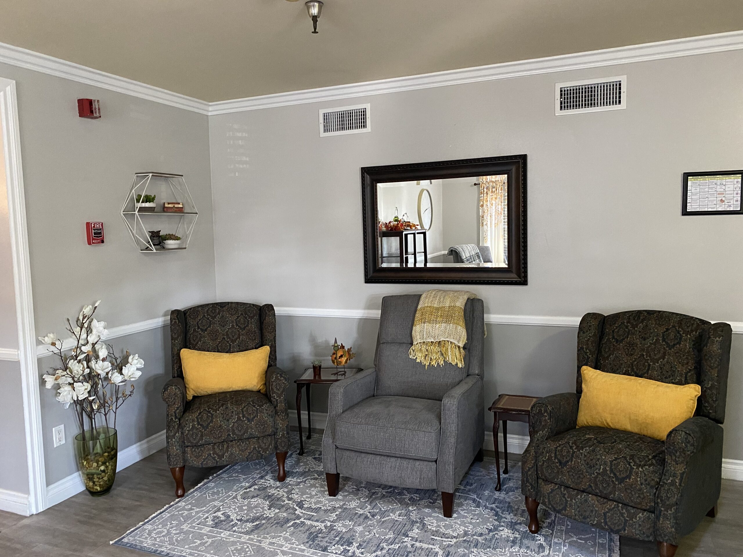 Cozy common area with seating and decor.