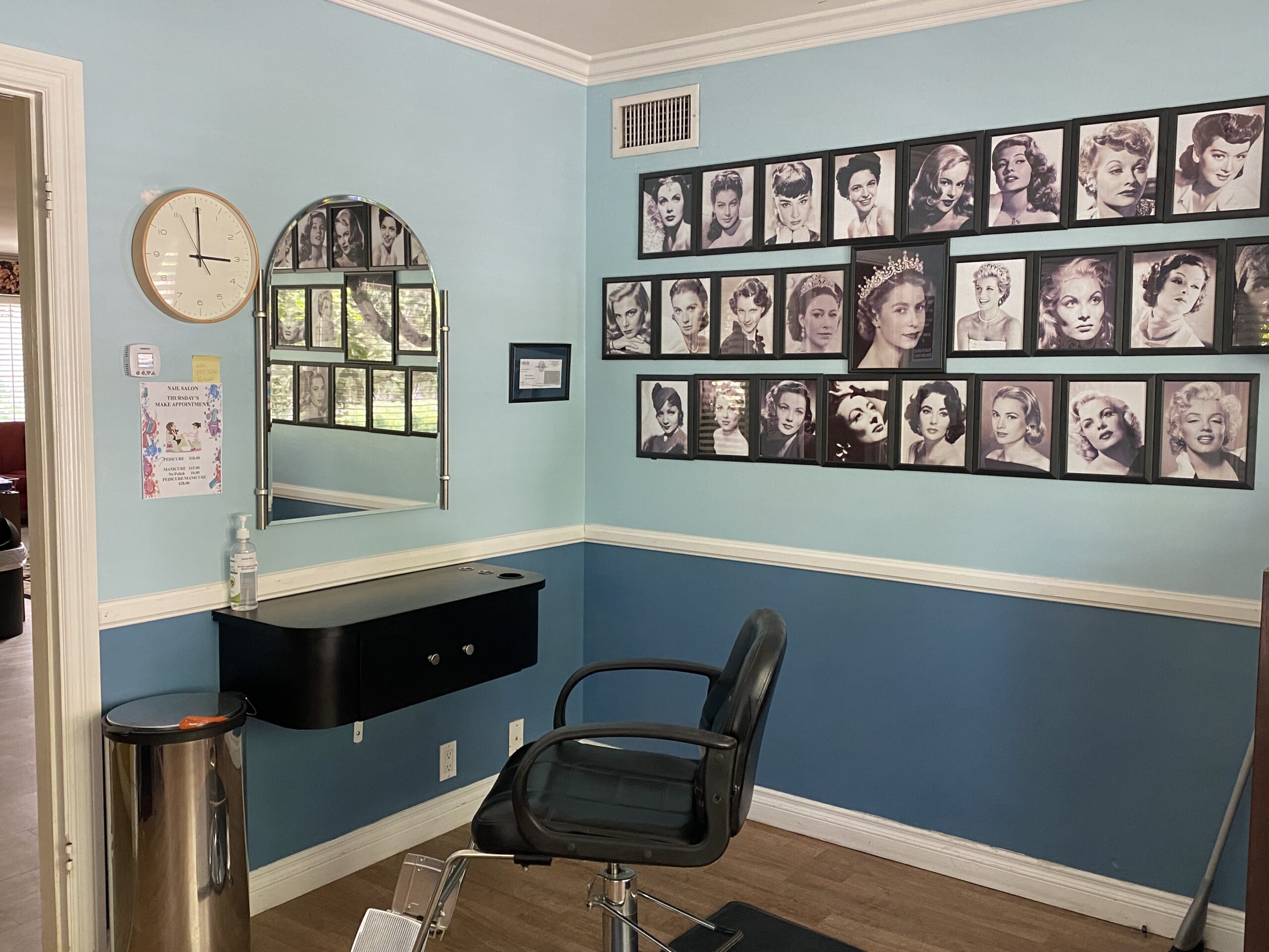 Hair salon area with vintage celebrity portraits