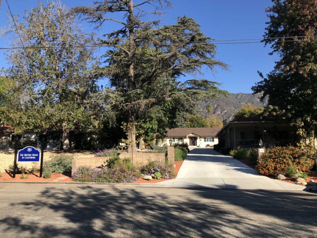 Exterior view of assisted living facility with landscaped garden