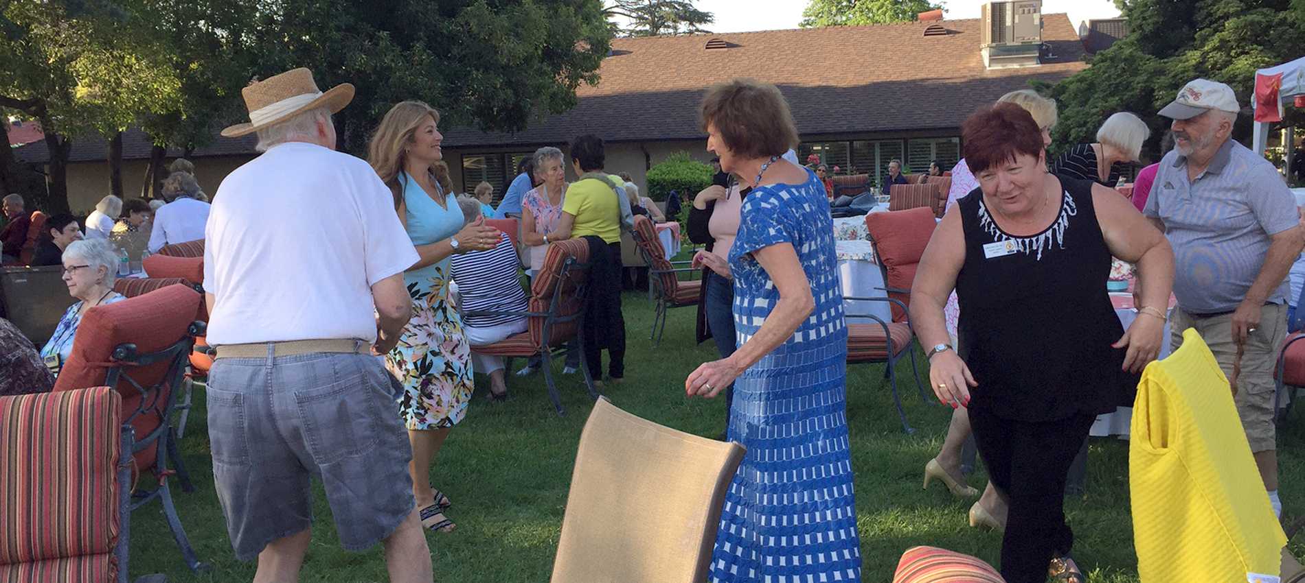 Residents enjoying a lively outdoor gathering