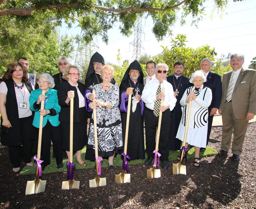 Groundbreaking ceremony with community members and staff.