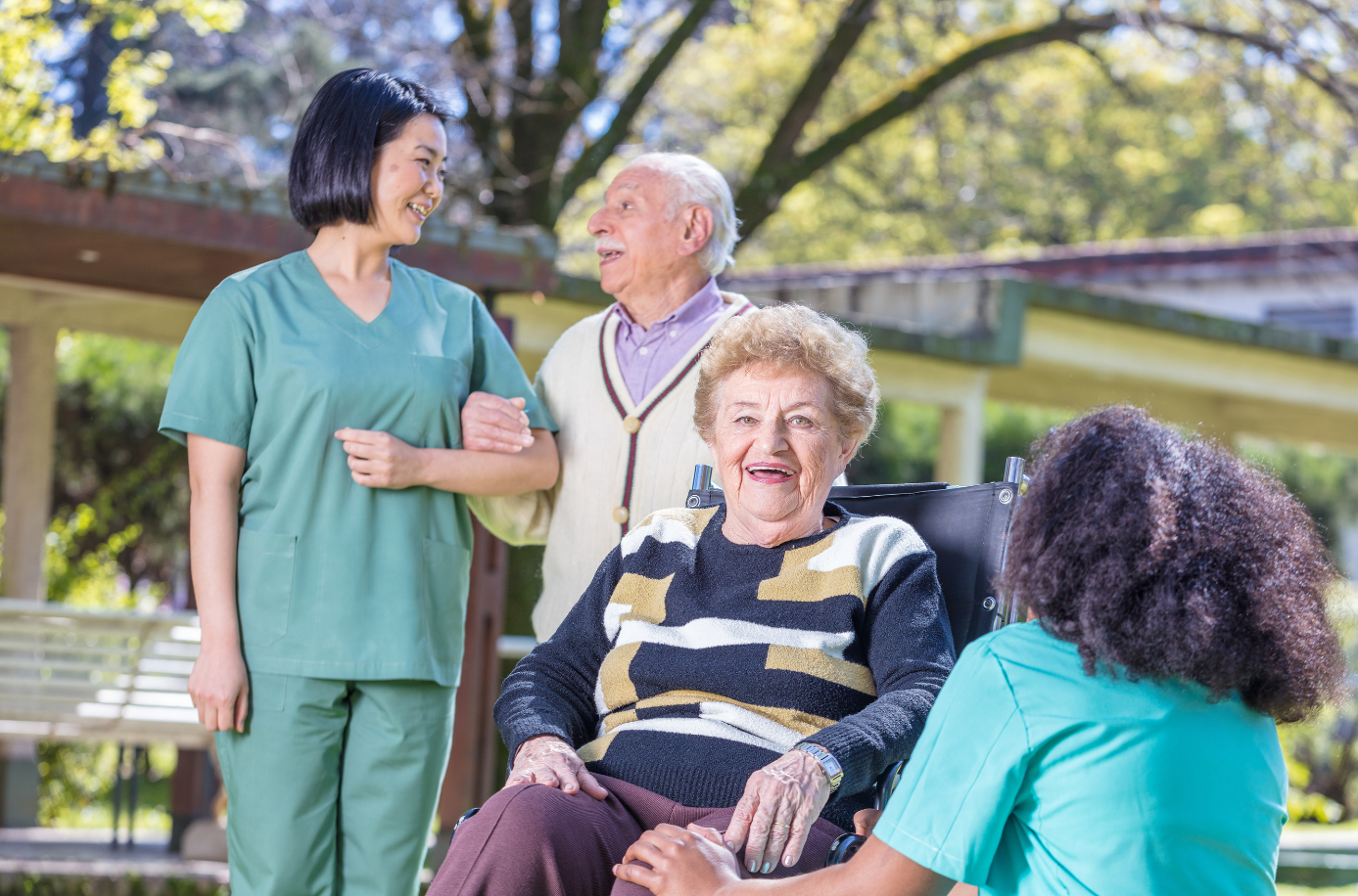 Residents and staff socializing outdoors