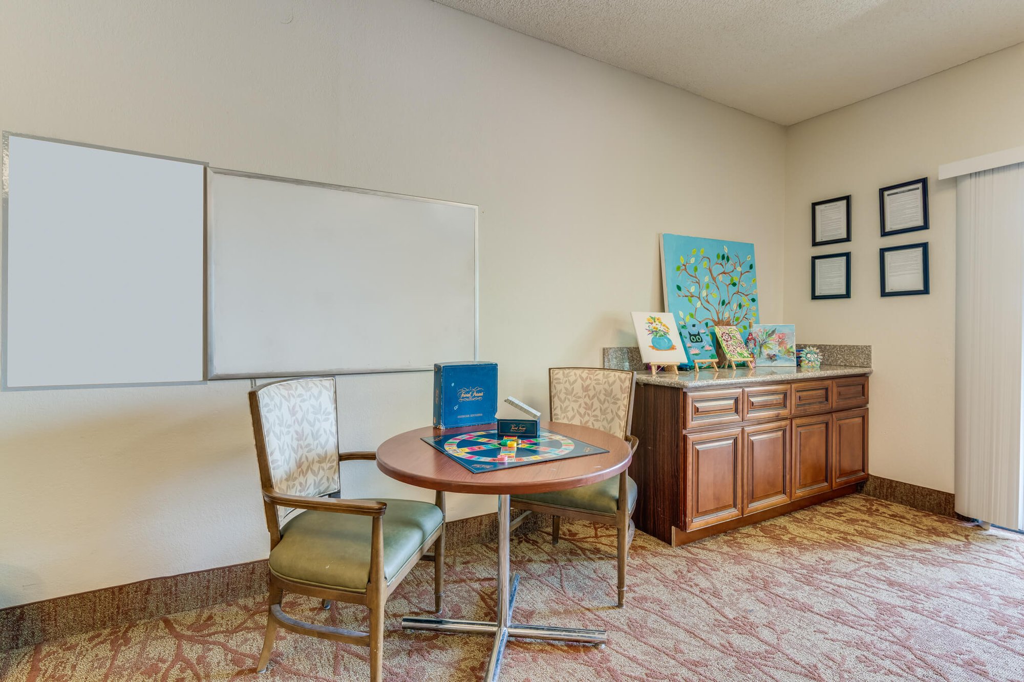 Common area with game table and decor
