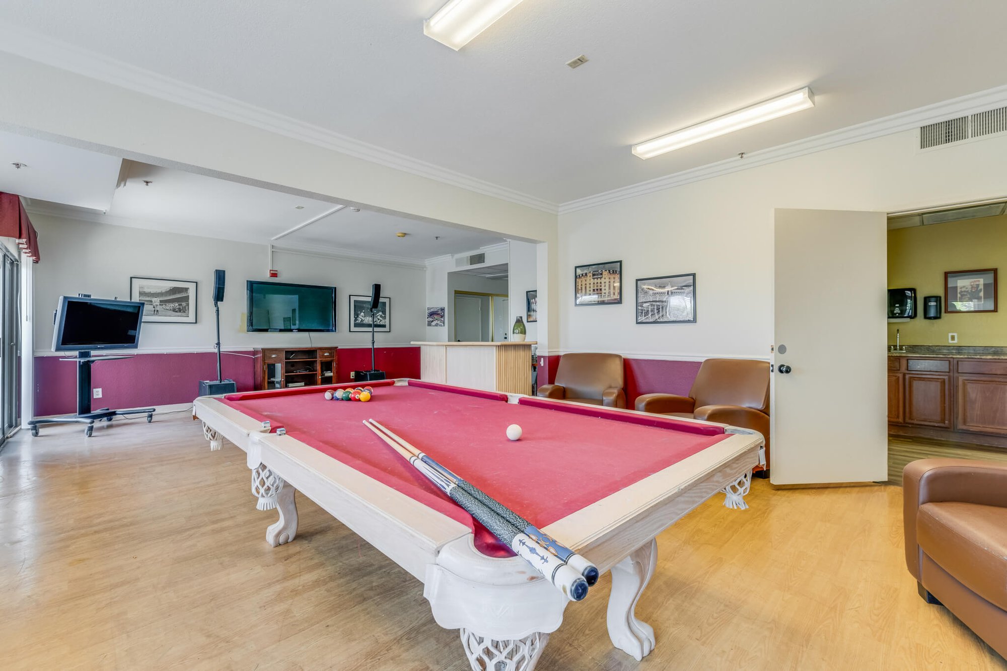 Common area with billiards table and seating