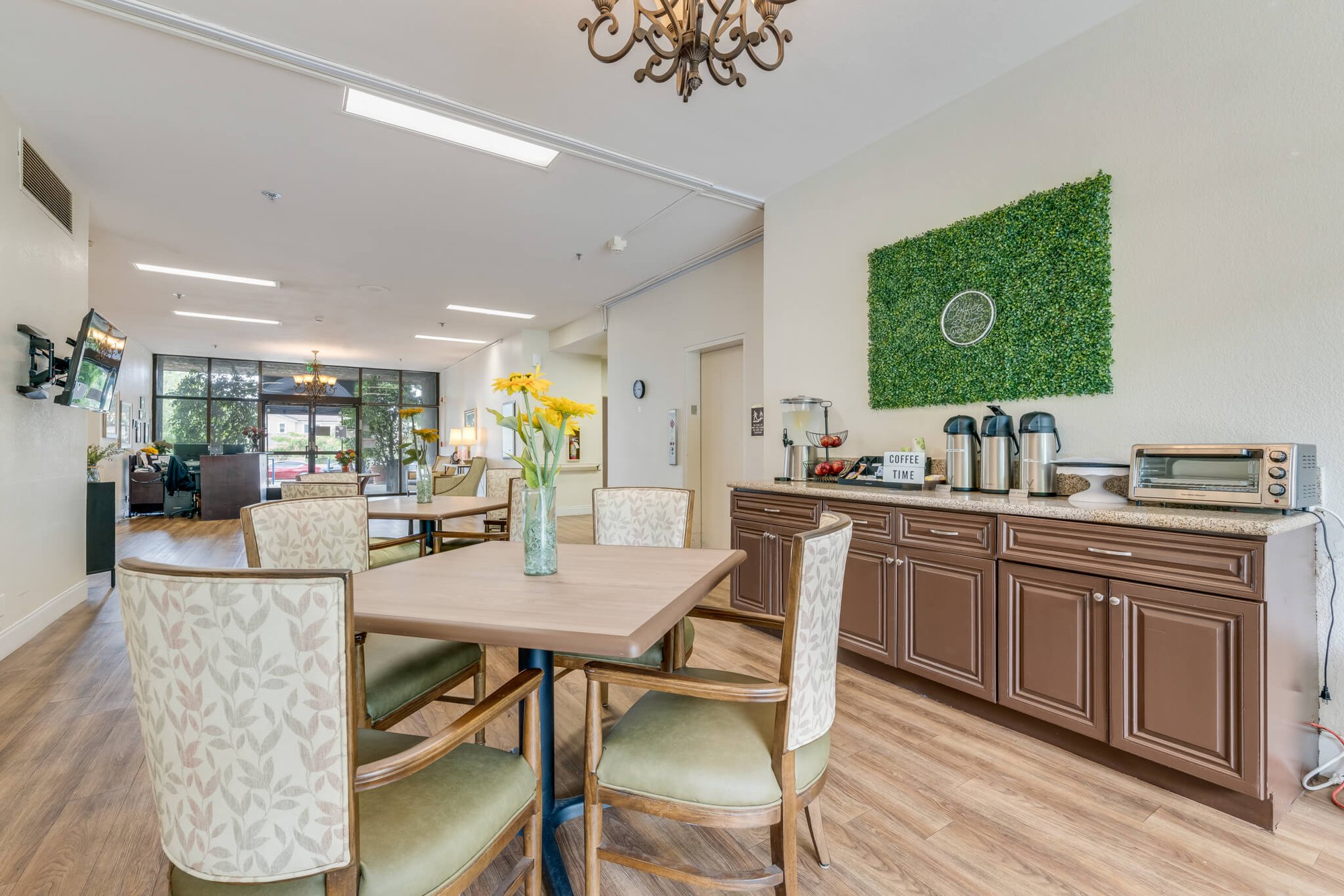Bright common area with seating and decor