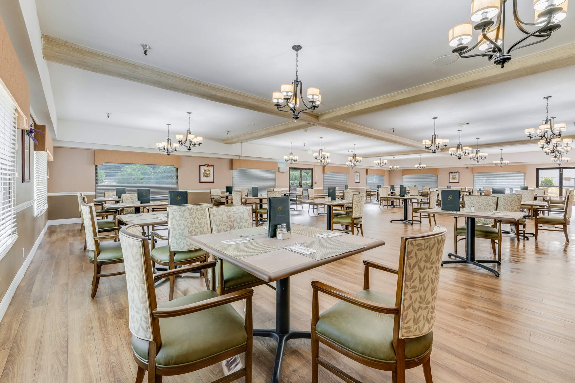 Spacious dining area with tables and chairs
