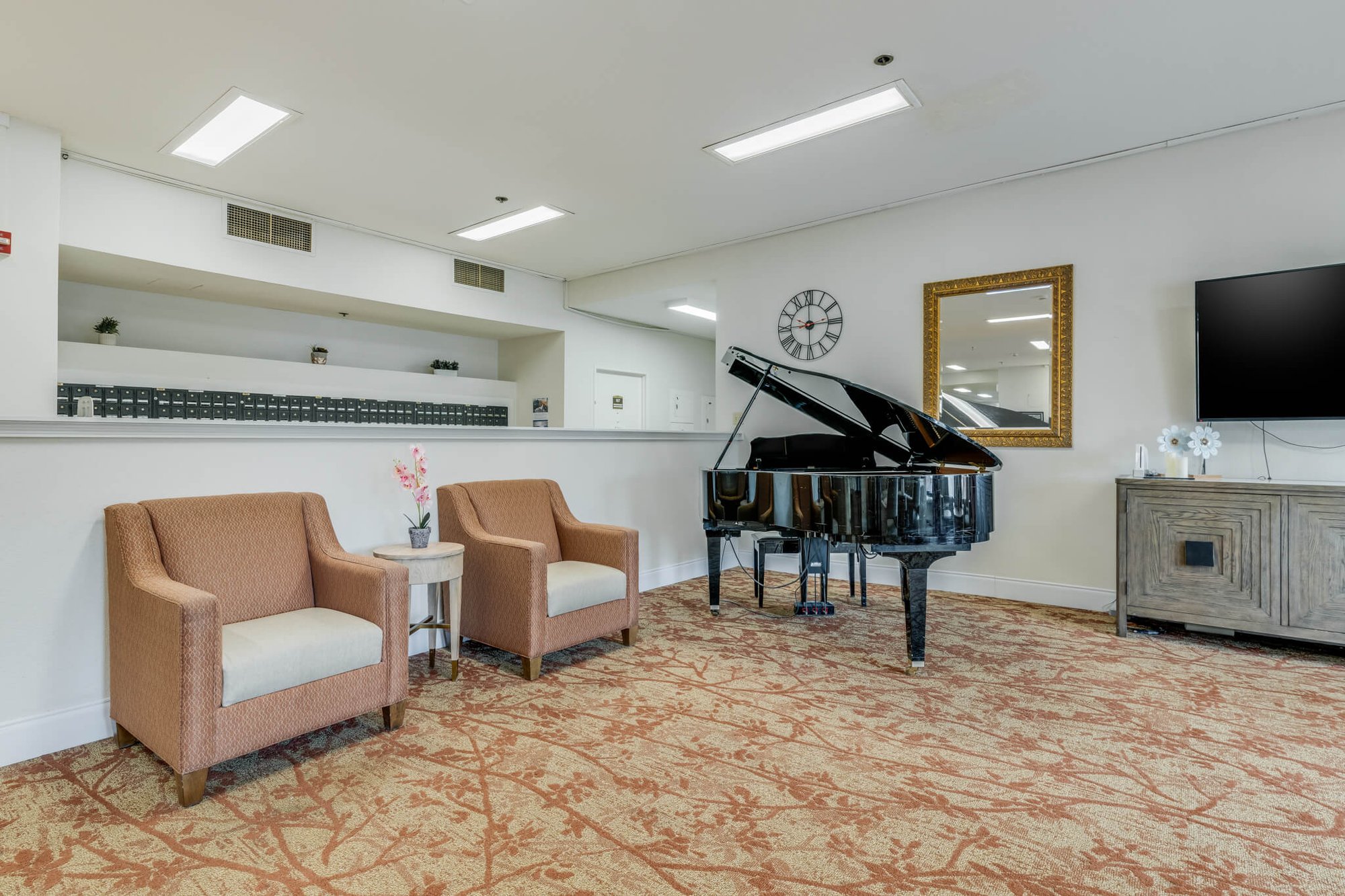 Interior common area with piano and seating