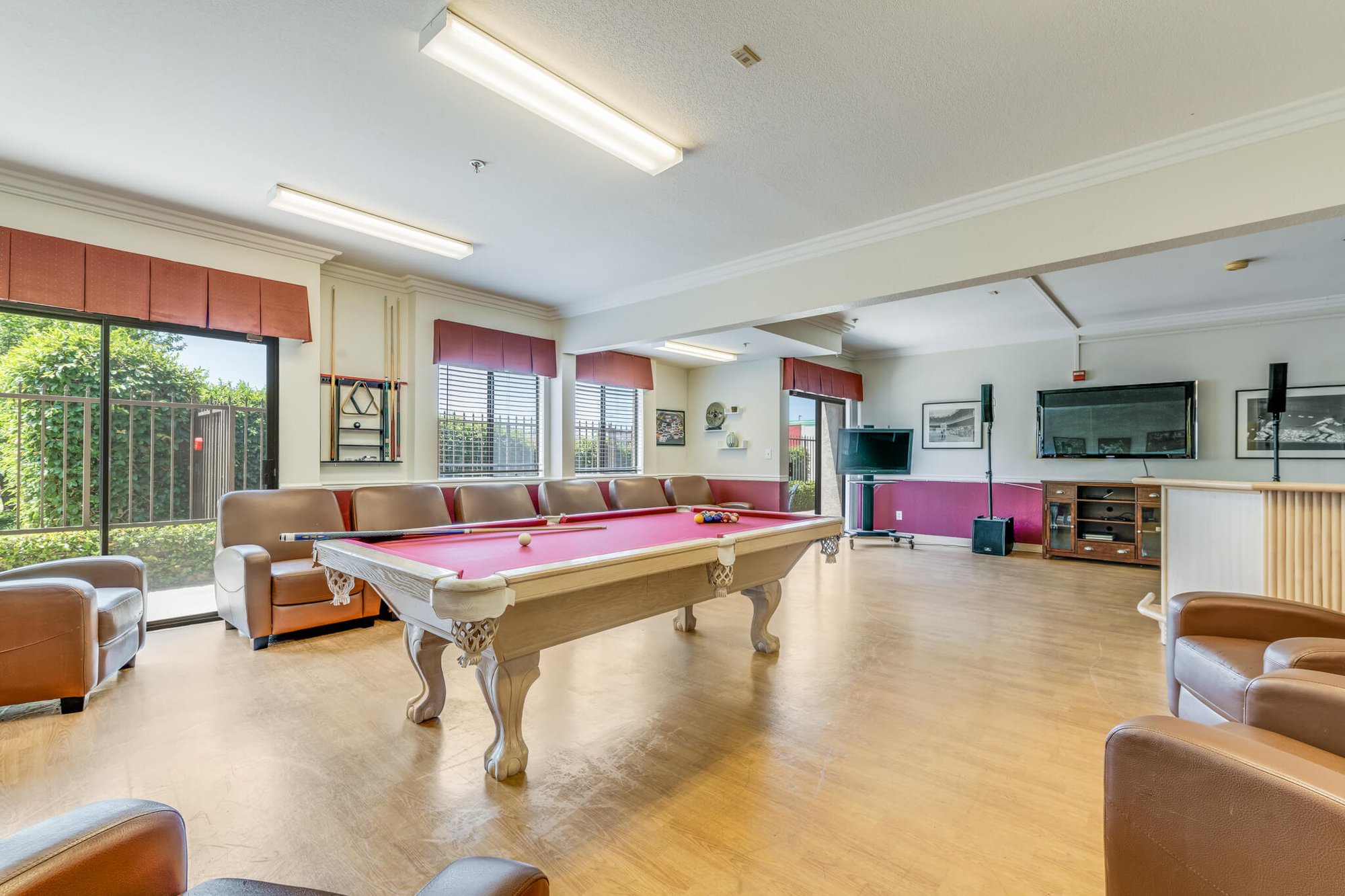 Common area with pool table and seating