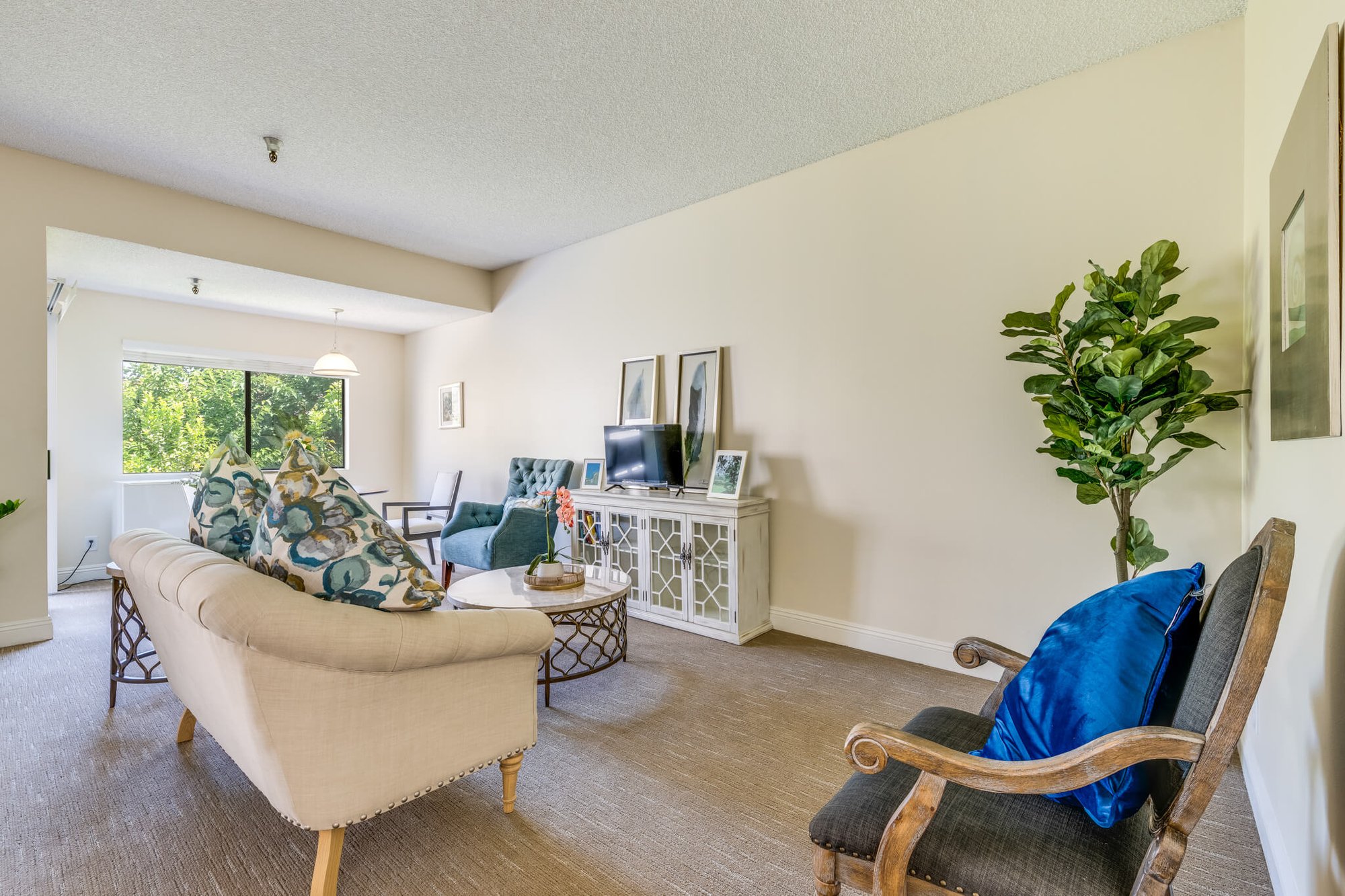 Common area with seating and natural light