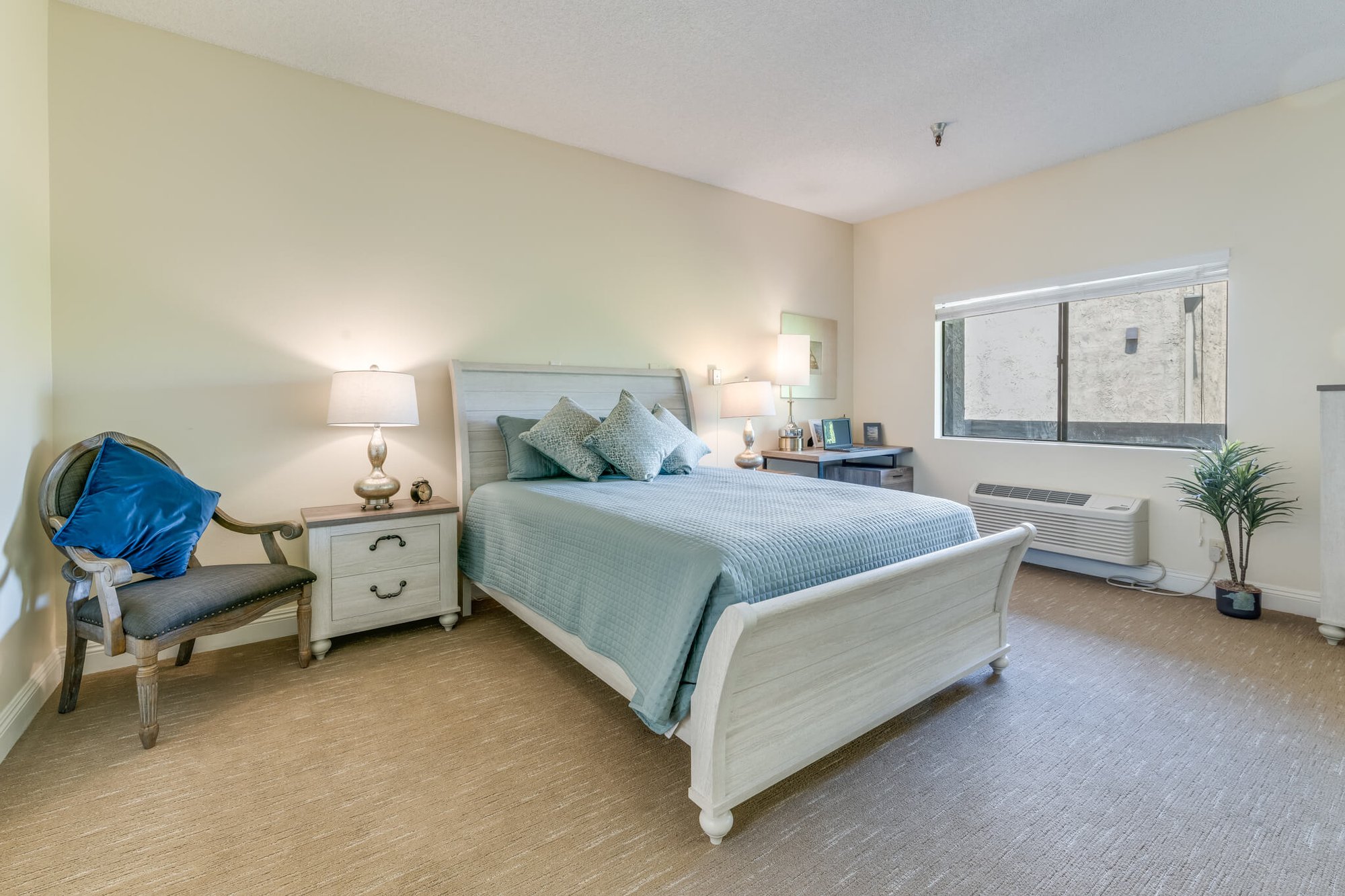 Cozy bedroom with light-colored furnishings