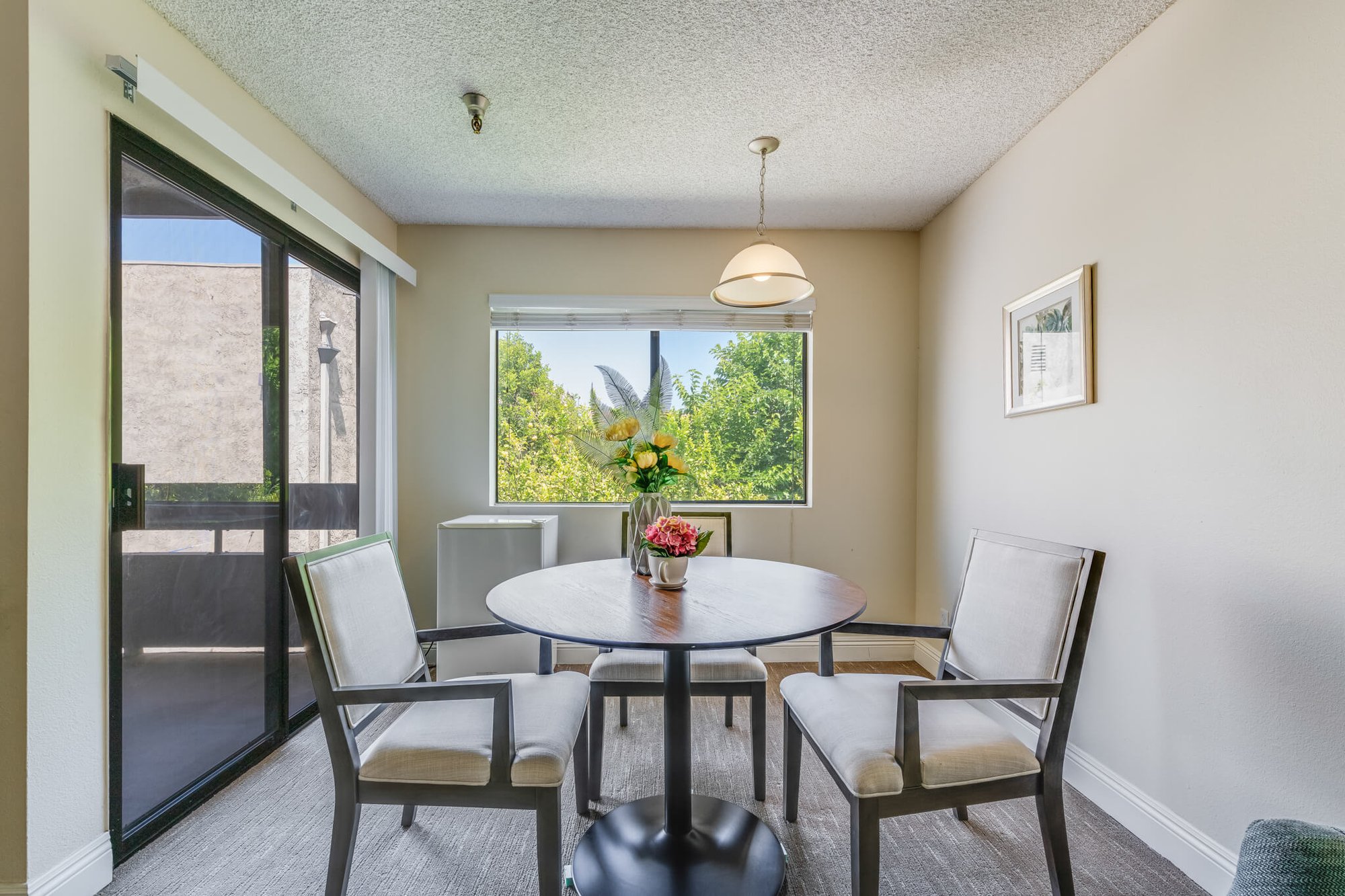 Bright dining area with a table and chairs