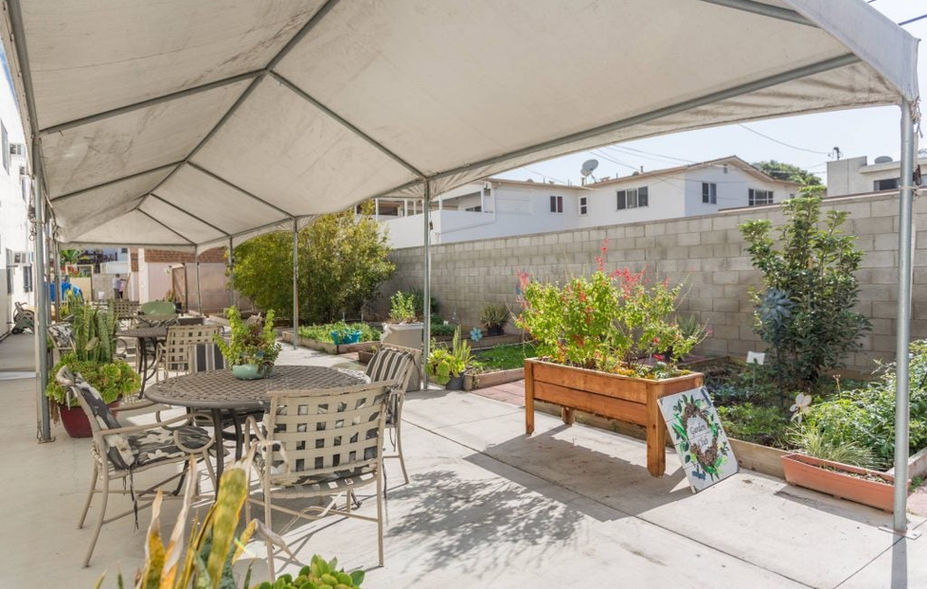 Outdoor garden area with seating arrangements