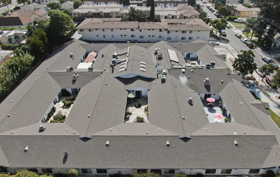 Aerial view of the facility's layout and gardens.