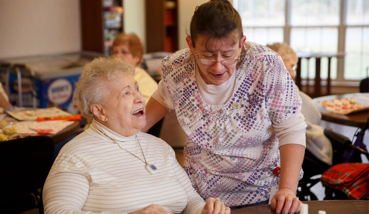 Resident enjoying time with caregiver