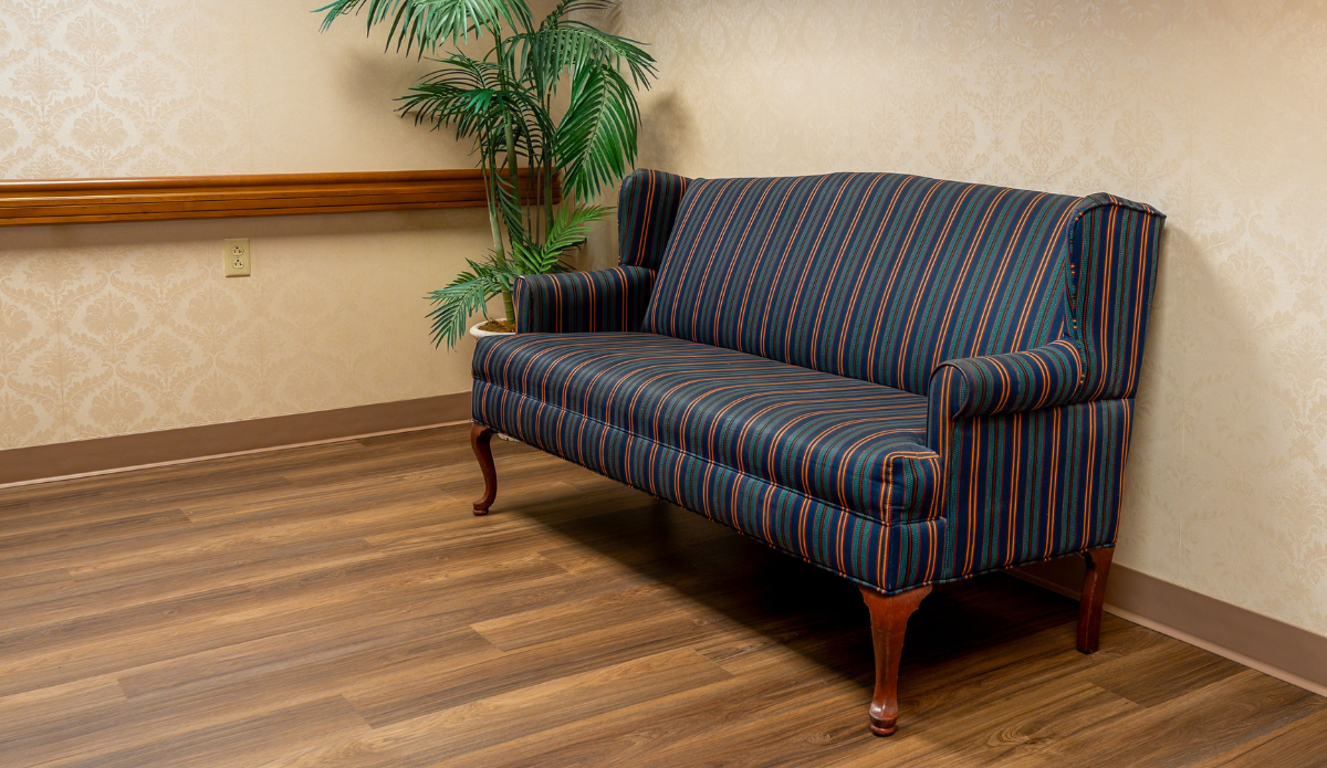 Striped couch in a facility interior