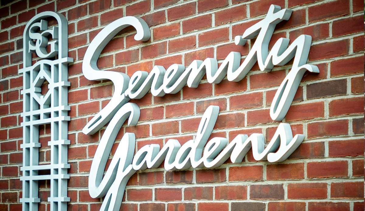 Facility name on exterior wall in elegant lettering.