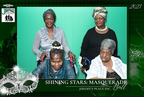 Residents and staff at a masquerade ball.