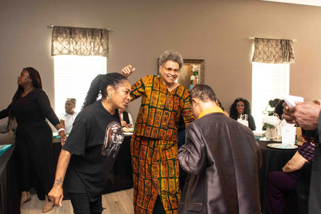 Residents enjoying a lively activity in a common area.