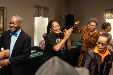 Residents and staff enjoying a lively celebration.