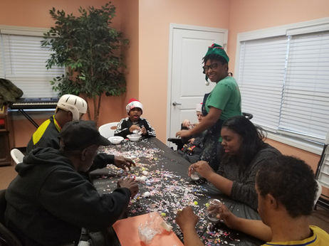 Residents engaging in a festive craft activity.