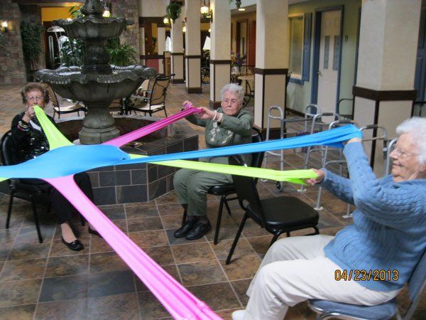 Residents engaging in a group activity indoors.