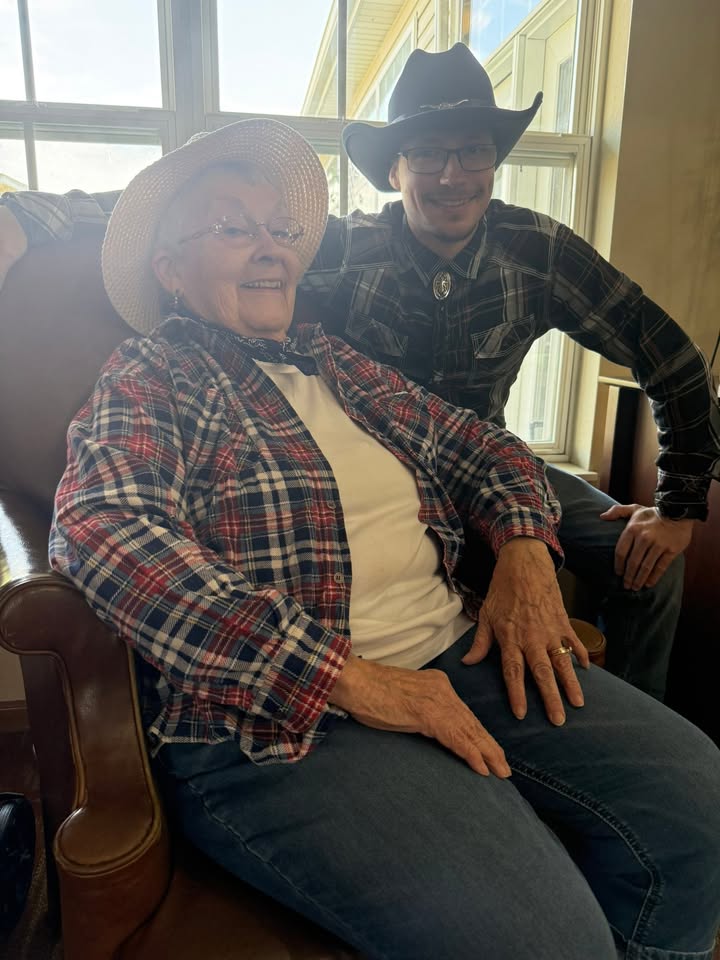 Resident and staff member enjoying a moment together.