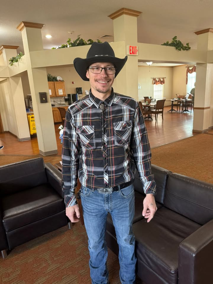 Resident wearing cowboy attire in common area