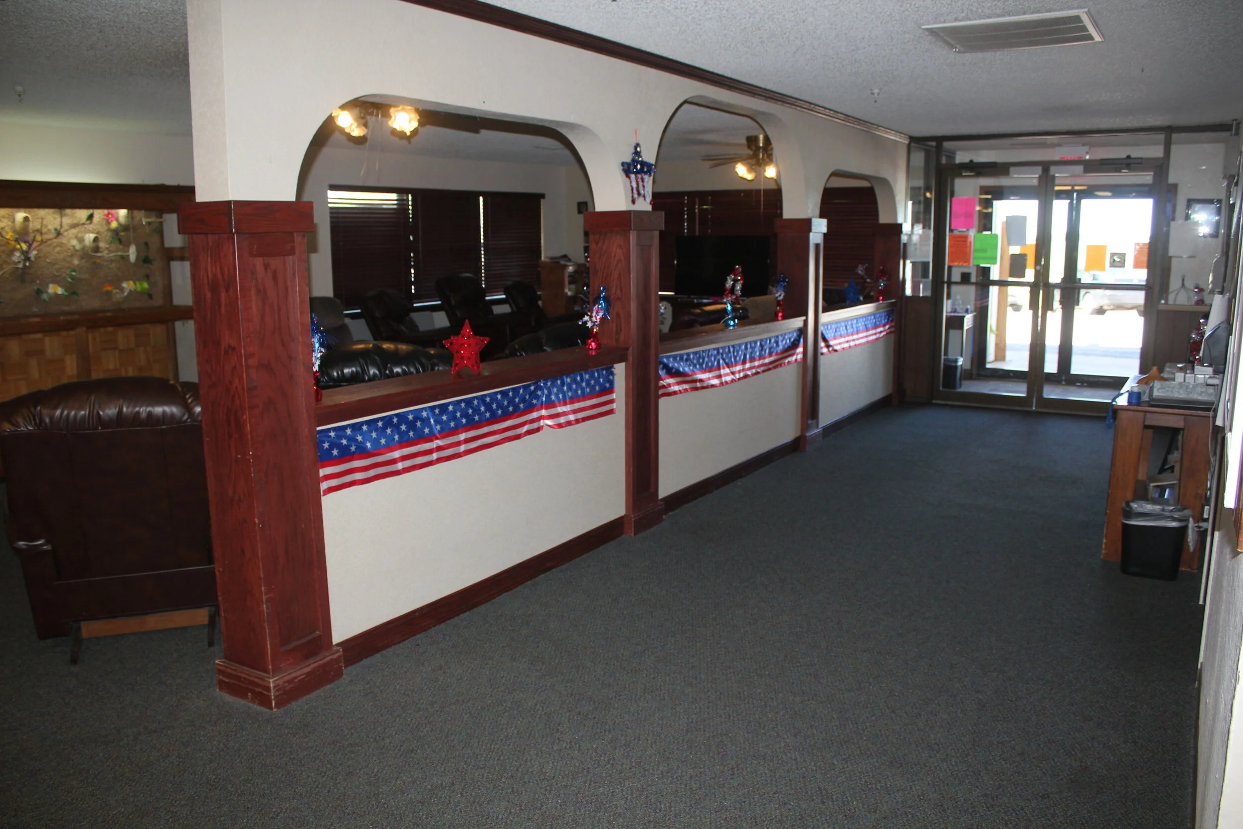 Interior corridor with patriotic decorations and seating