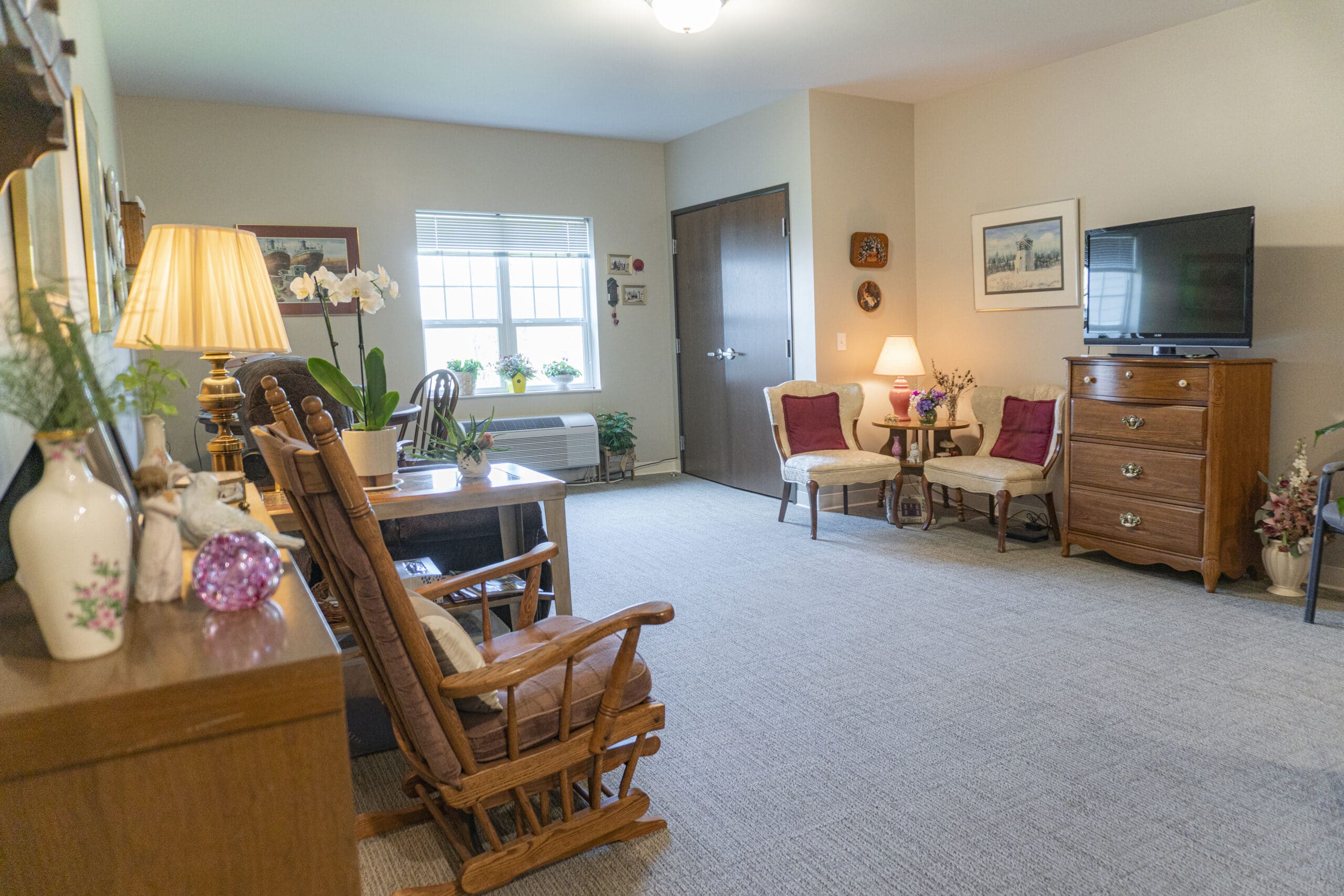 Cozy common area with seating and decor.