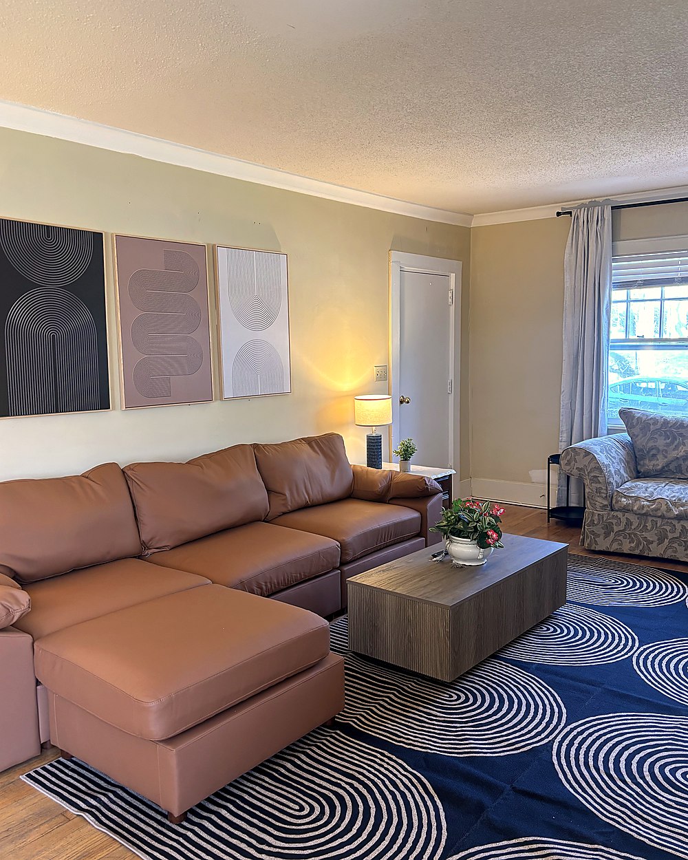 Cozy common area with seating and decor.