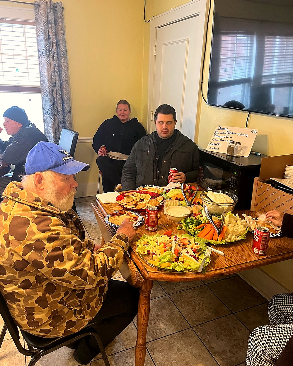 Residents enjoying a meal together in a common area