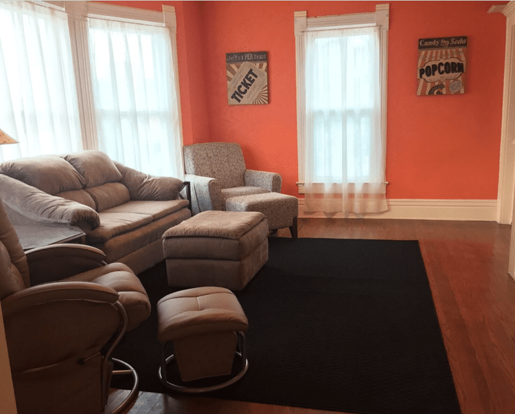 Cozy common area with seating and warm colors