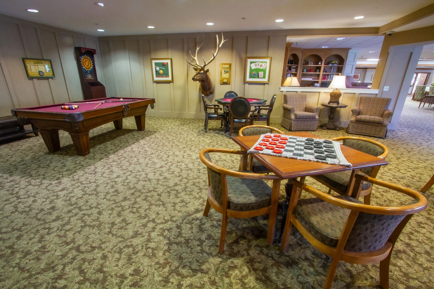 Common area with game tables and seating