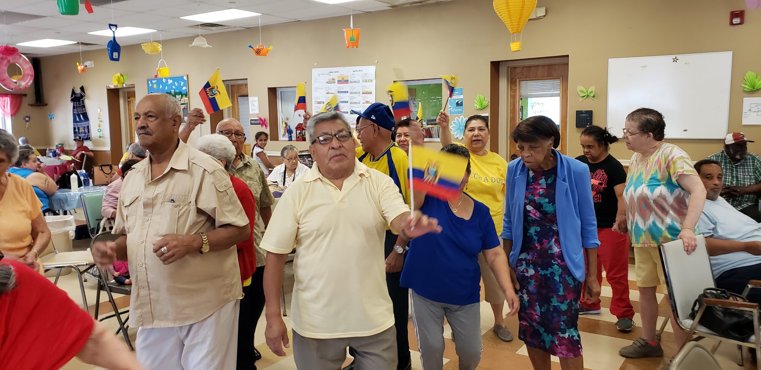 Residents participating in a lively indoor event.