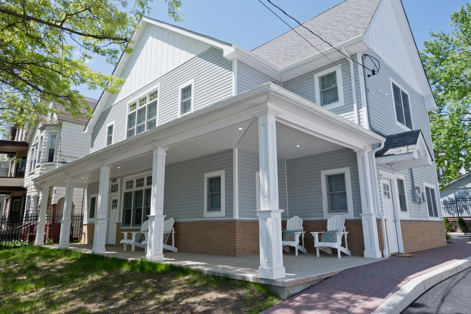 Exterior view of a senior care facility with seating