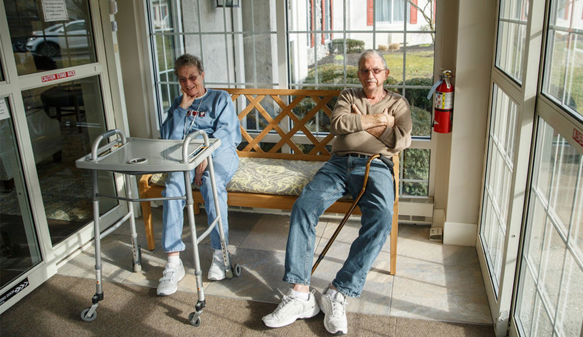 Two residents relaxing in a common area