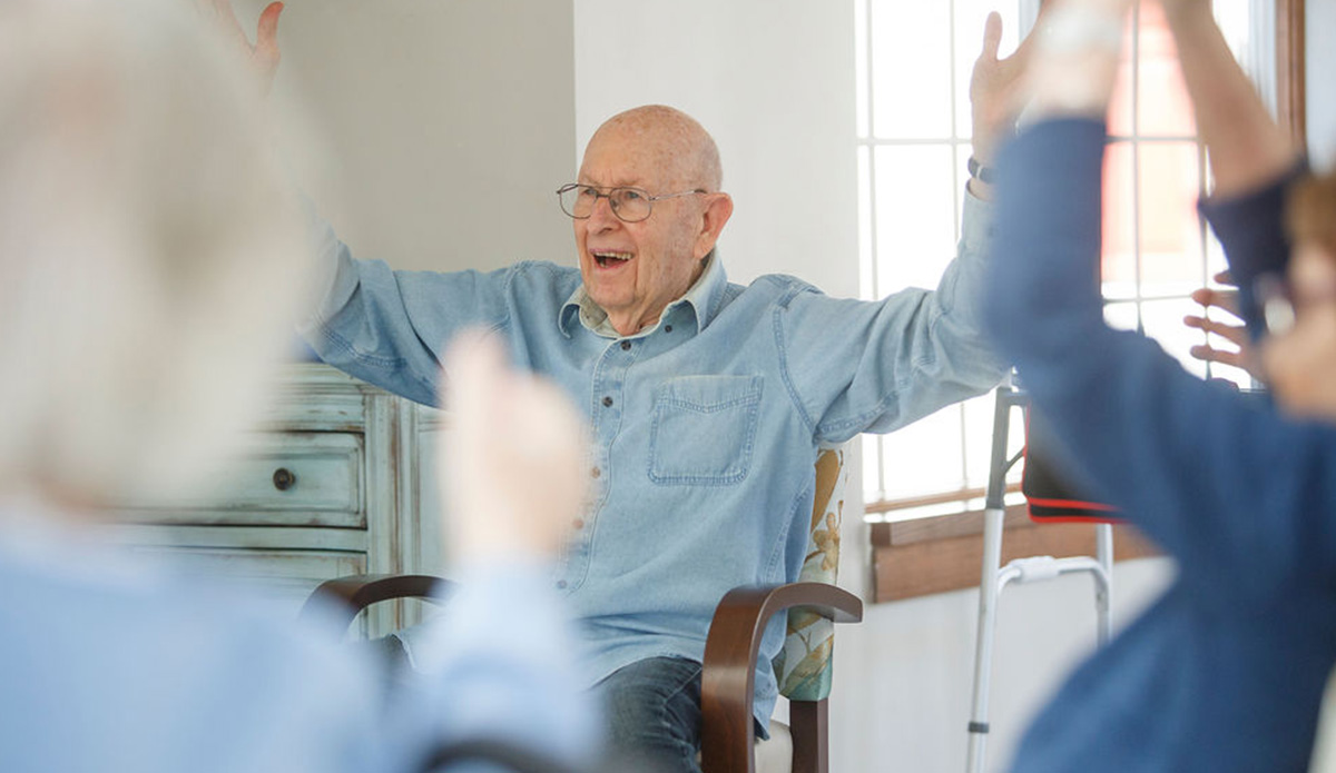 Engaged senior participating in a group activity