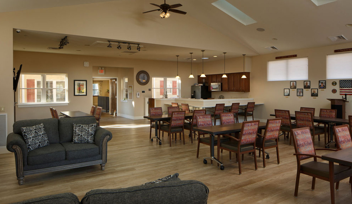 Interior of a common area with tables and seating