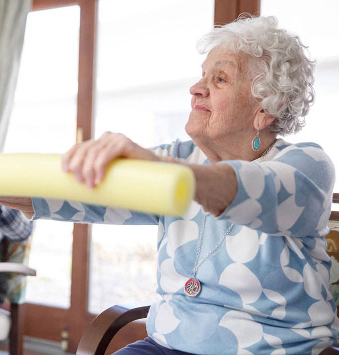 Elderly woman engaged in a physical activity