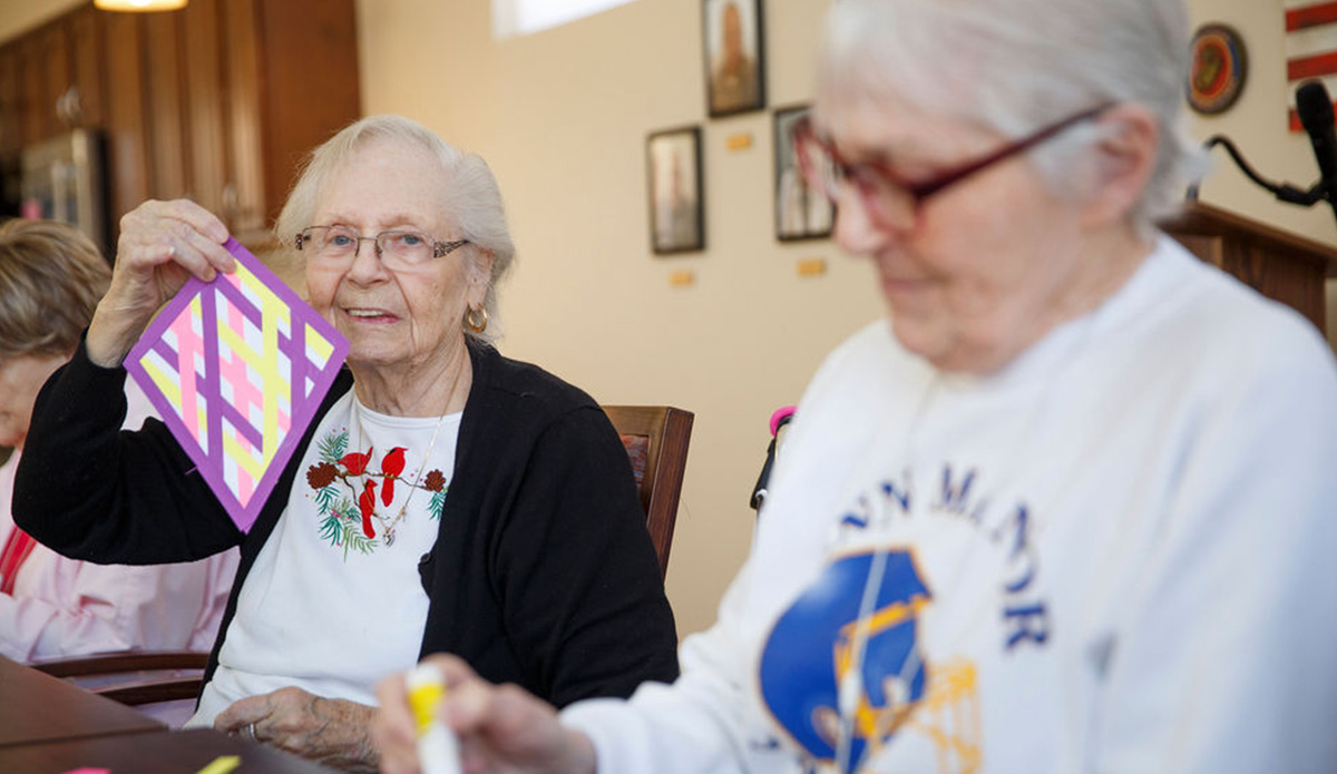 Residents engaged in an arts and crafts activity.