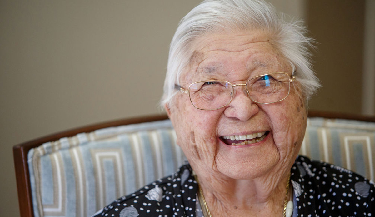 Smiling senior woman with glasses