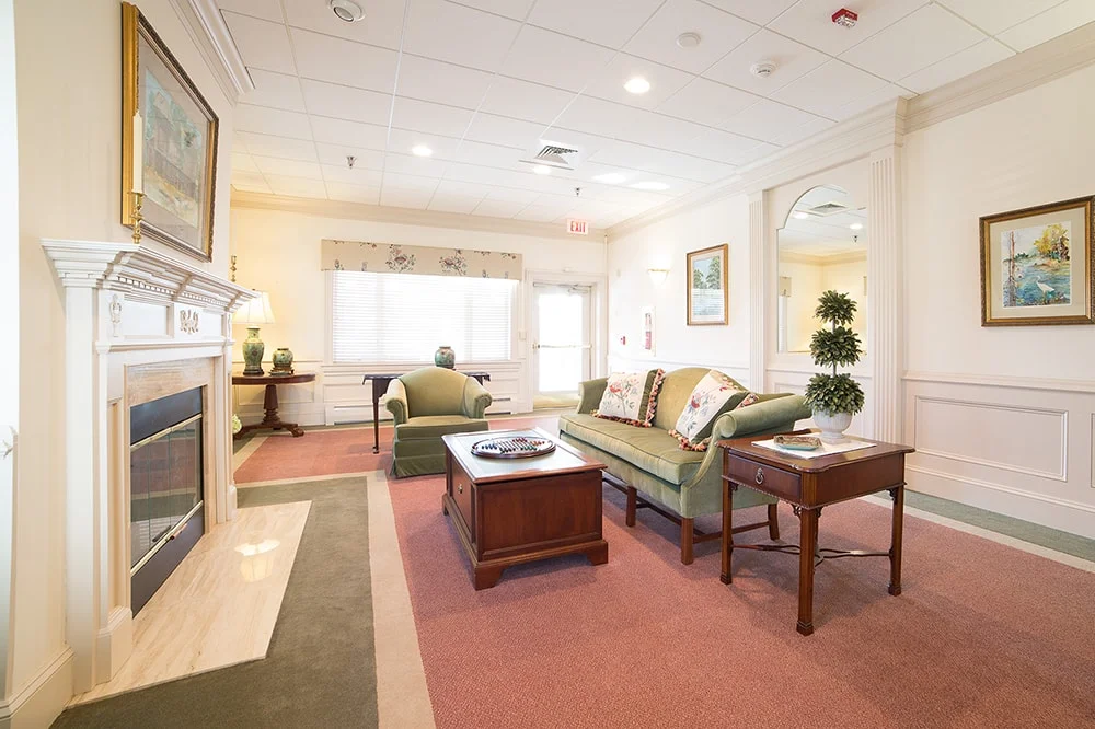 Comfortable indoor common area with furniture and decor.