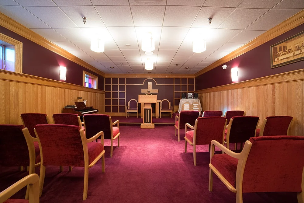 Interior of a multi-purpose room with seating.